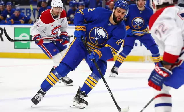 FILE - Buffalo Sabres left wing Jordan Greenway (12) skates during the first period in Game 2 of a second-round NHL hockey Stanley Cup playoff series against the Montreal Canadiens Friday, May 8, 2026, in Buffalo, N.Y. (AP Photo/Jeffrey T. Barnes,File)