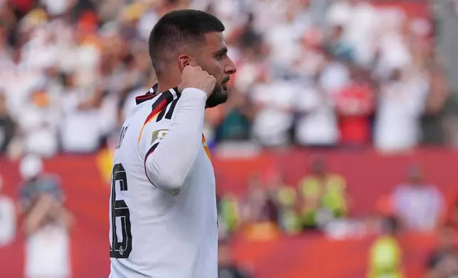 Germany's Deniz Undav (26) celebrates after scoring their second goal during the World Cup Group E soccer match between Germany and Ivory Coast in Toronto, Saturday, June 20, 2026. (AP Photo/Stephanie Scarbrough)