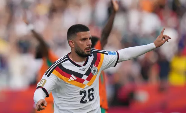 Germany's Deniz Undav celebrates after scoring their second goal during the World Cup Group E soccer match between Germany and Ivory Coast in Toronto, Saturday, June 20, 2026. (AP Photo/Stephanie Scarbrough)