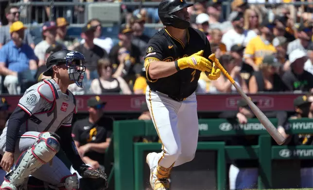 Pittsburgh Pirates' Nick Gonzales, right, watches his double off Minnesota Twins pitcher Zebby Matthews in the fifth inning of a baseball game in Pittsburgh, Sunday, May 31, 2026. (AP Photo/Tom E. Puskar)