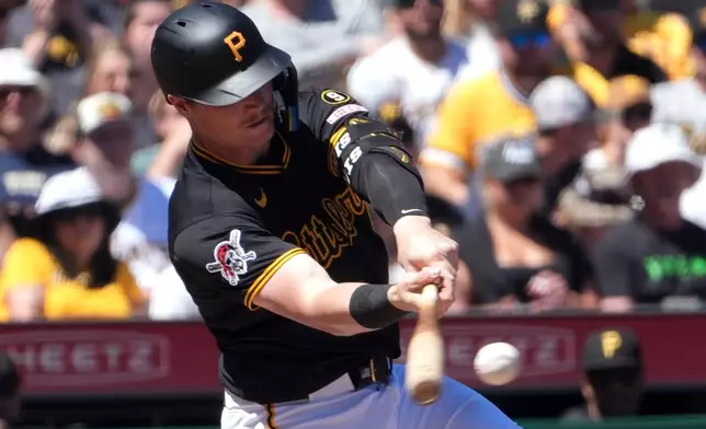 Pittsburgh Pirates' Henry Davis singles off of Minnesota Twins pitcher Mike Paredes driving in two runs in the fifth inning of a baseball game in Pittsburgh, Sunday, May 31, 2026. (AP Photo/Tom E. Puskar)