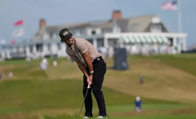 Ryder Cowan reacts after missing a putt on the first hole during the first round of the U.S. Open golf tournament at Shinnecock Hills Golf Club in Southampton, N.Y., Thursday, June 18, 2026.(AP Photo/David J. Phillip)