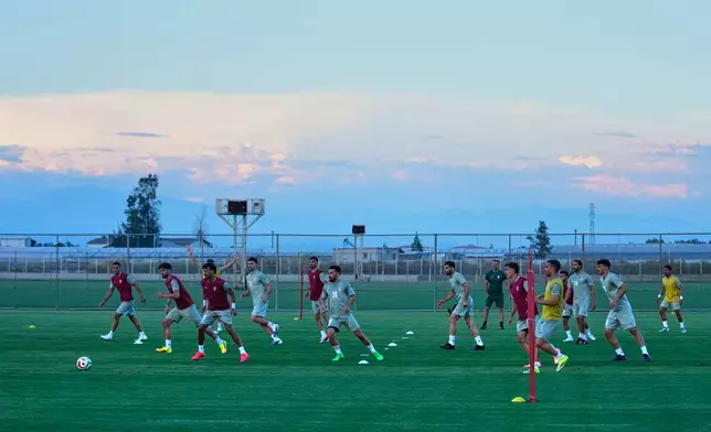 Iran's players work out during a training session, in Antalya, southern Turkey, Tuesday, June 2, 2026, ahead of the World Cup soccer tournament. (AP Photo/Khalil Hamra)