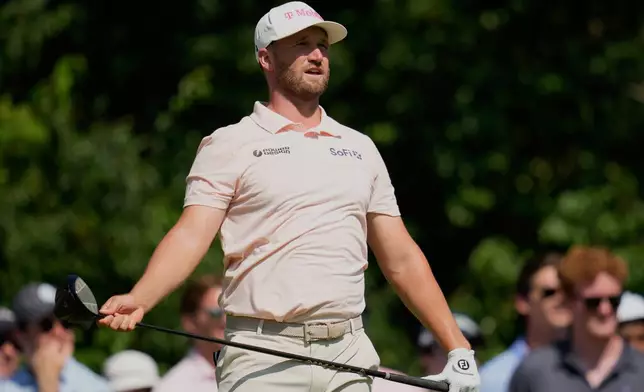 Wyndham Clark watches his tee shot on the 15th hole during the final round of the Memorial golf tournament, Sunday, June 7, 2026, in Dublin, Ohio. (AP Photo/Sue Ogrocki)