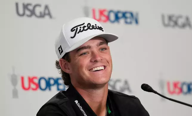 Jackson Kouvin speaks during a news conference at the U.S. Open golf tournament at Shinnecock Hills Golf Club in Southampton, N.Y., Monday, June 15, 2026.(AP Photo/David J. Phillip)