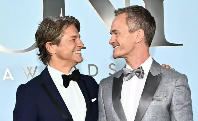 David Burtka, left, and Neil Patrick Harris arrive at the 79th Tony Awards on Sunday, June 7, 2026, at Radio City Music Hall in New York. (Photo by Evan Agostini/Invision/AP)