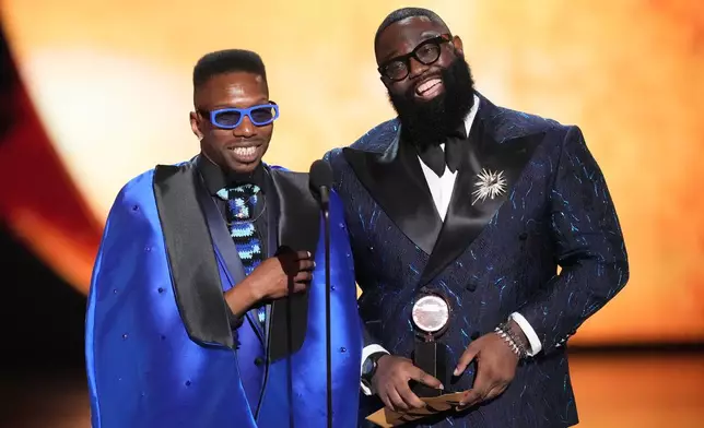 Omari Wiles, left, and Arturo Lyons accept the award for best choreography for "Cats: The Jellicle Ball" during the 79th Tony Awards on Sunday, June 7, 2026, at Radio City Music Hall in New York. (Photo by Charles Sykes/Invision/AP)
