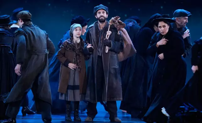 Brandon Uranowitz, center, performs a song from "Ragtime" during the 79th Tony Awards on Sunday, June 7, 2026, at Radio City Music Hall in New York. (Photo by Charles Sykes/Invision/AP)