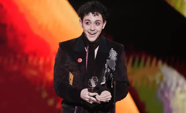 Ali Louis Bourzgui accepts the award for best performance by an actor in a featured role in a musical for "The Lost Boys" during the 79th Tony Awards on Sunday, June 7, 2026, at Radio City Music Hall in New York. (Photo by Charles Sykes/Invision/AP)