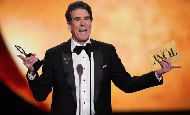 Cinco Paul accepts the award for best original score written for the theatre for "Schmigadoon!" during the 79th Tony Awards on Sunday, June 7, 2026, at Radio City Music Hall in New York. (Photo by Charles Sykes/Invision/AP)