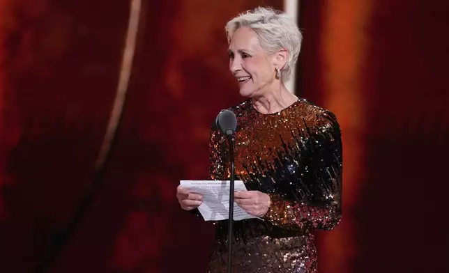Laurie Metcalf accepts the award for best performance by a featured actress in a play for "Death of a Salesman" during the 79th Tony Awards on Sunday, June 7, 2026, at Radio City Music Hall in New York. (Photo by Charles Sykes/Invision/AP)