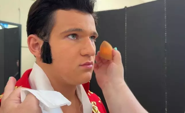 Charles Session, 15, holds still while he gets his makeup done ahead of the Tupelo Elvis Festival's youth tribute artists competition on June 4, 2026, in Tupelo, Miss. (AP Photo/Sophie Bates)