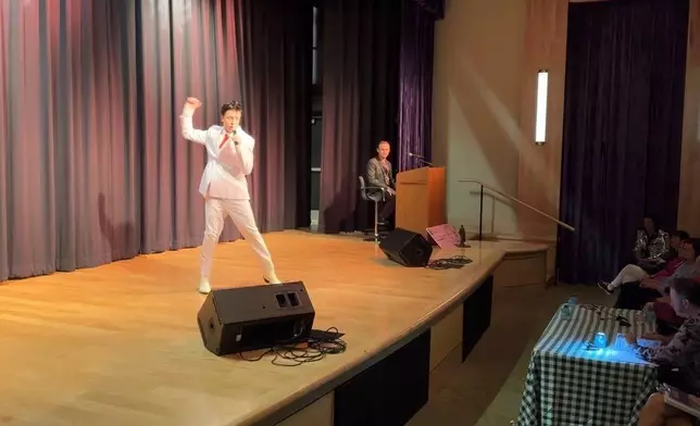 Ayden Maloy, 16, performs at the Tupelo Elvis Festival's youth tribute artists competition on June 4, 2026, in Tupelo, Miss. (AP Photo/Sophie Bates)