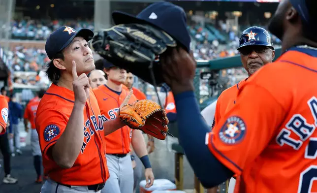Houston Astros' Tatsuya Imai, left, celebrates with Taylor Trammell, right, after leaving a baseball game against the Detroit Tigers during the sixth inning Thursday, June 25, 2026, in Detroit. (AP Photo/Duane Burleson)
