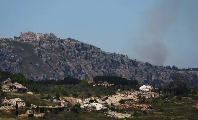 Smoke rises near the Beaufort Castle in southern Lebanon as seen from northern Israel, Thursday June 4, 2026. (AP Photo/Ariel Schalit)