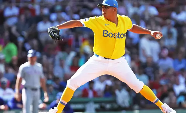 Boston Red Sox pitcher Ranger Suarez delivers during the first inning of a baseball game against the Texas Rangers, Saturday, June 13, 2026, in Boston. (AP Photo/Jim Davis)