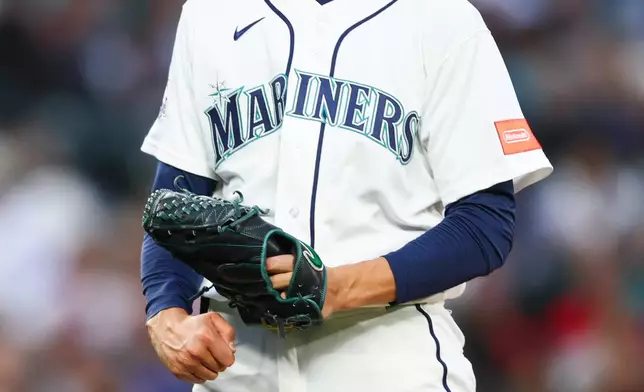 Seattle Mariners pitcher George Kirby reacts after striking out Los Angeles Angels' Nolan Schanuel in the seventh inning of a baseball game Monday, June 29, 2026, in Seattle. (AP Photo/Kevin Ng)