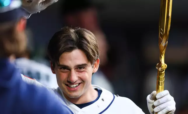 Seattle Mariners' Cole Young reacts after hitting a home run in the sixth inning of a baseball game against the Los Angeles Angels, Monday, June 29, 2026, in Seattle. (AP Photo/Kevin Ng)