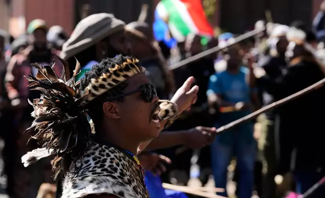Protesters march against illegal immigration, in Johannesburg, South Africa, Tuesday, June 30, 2026. (AP Photo/Themba Hadebe)