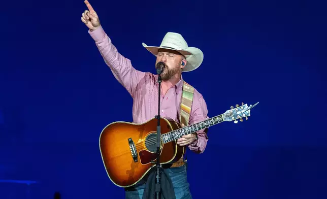 FILE - Cody Johnson performs at the Braves Country Fest in Atlanta on June 13, 2026. (Photo by Paul R. Giunta/Invision/AP, File)
