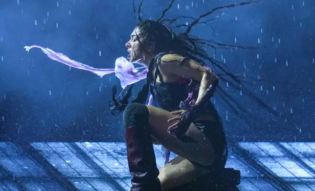 FILE - Charli xcx performs at the Glastonbury Festival in Somerset, England on June 28, 2025. (Scott A Garfitt/Invision/AP, File)