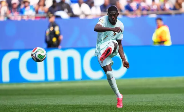 France's Ousmane Dembele scores his side's second goal during the World Cup Group I soccer match between Norway and France in Foxborough, Mass., near Boston, Friday, June 26, 2026. (AP Photo/Martin Meissner)