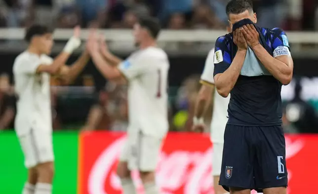 Uruguay's Rodrigo Bentancur (6) reacts following the World Cup Group H soccer match between Uruguay and Spain in Zapopan, near Guadalajara, Mexico, Friday, June 26, 2026. (AP Photo/Silvia Izquierdo)