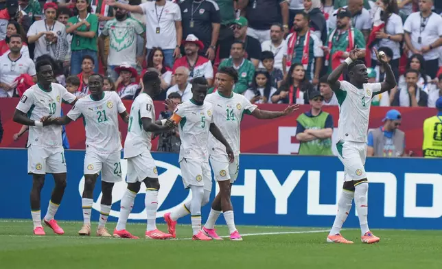Senegal's Habib Diarra (21) celebrates scoring their first goal during the World Cup Group I soccer match between Senegal and Iraq in Toronto, Friday, June 26, 2026. (AP Photo/Stephanie Scarbrough) CORRECTION: Corrects goal scorer to Senegal's Habib Diarra (21), not Abdoulaye Seck.