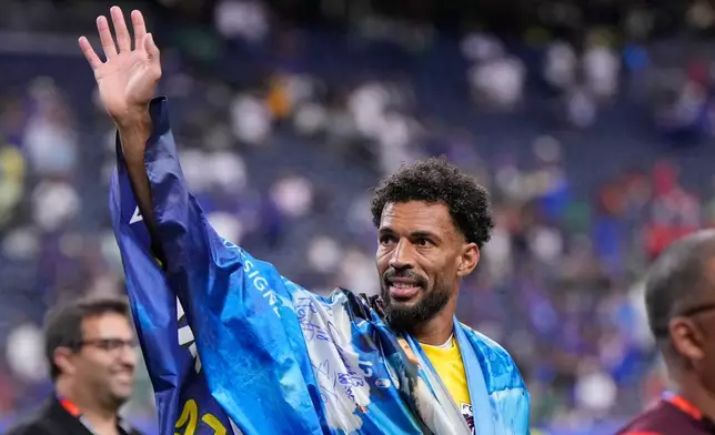Cape Verde goalkeeper Vozinha (1) celebrates after the World Cup Group H soccer match between Cape Verde and Saudi Arabia in Houston, Friday, June 26, 2026. (AP Photo/Ashley Landis)