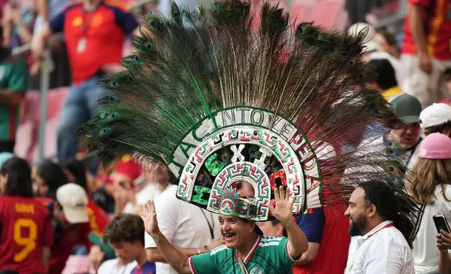 Fans react during the World Cup Group H soccer match between Uruguay and Spain in Zapopan, near Guadalajara, Mexico, Friday, June 26, 2026. (AP Photo/Silvia Izquierdo)