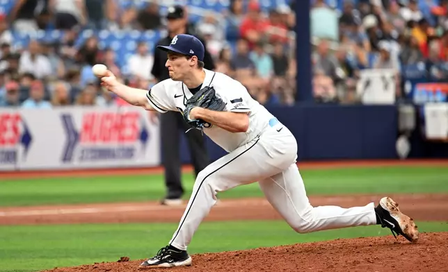 Tampa Bay Rays pitcher Kevin Kelly throws during the ninth inning of a baseball game against the Washington Nationals, Sunday, June 21, 2026, in St. Petersburg, Fla. (AP Photo/Jason Behnken)
