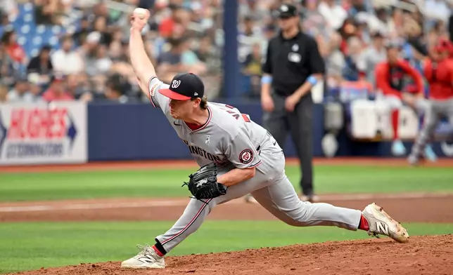 Washington Nationals pitcher Gus Varland throws during the fifth inning of a baseball game against the Tampa Bay Rays, Sunday, June 21, 2026, in St. Petersburg, Fla. (AP Photo/Jason Behnken)