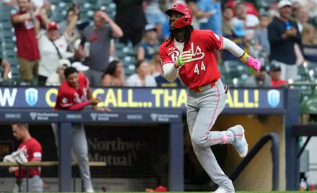 Cincinnati Reds' Elly De La Cruz (44) smiles as he rounds the base after hitting a two-run home run during the fifth inning of a baseball game against the Milwaukee Brewers, Monday, June 29, 2026, in Milwaukee. (AP Photo/Aaron Gash)