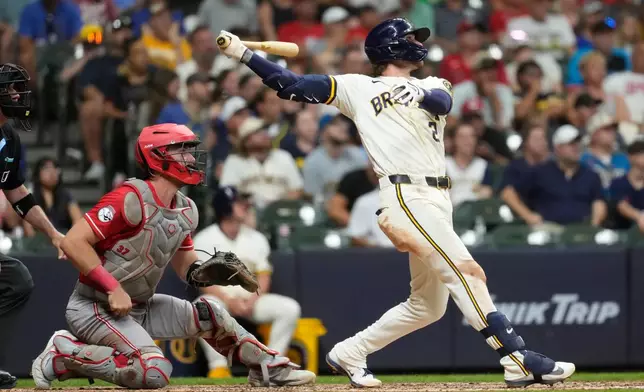 Milwaukee Brewers' Brice Turang hits a solo home run during the seventh inning of a baseball game against the Cincinnati Reds, Monday, June 29, 2026, in Milwaukee. (AP Photo/Aaron Gash)