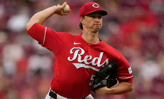 Cincinnati Reds pitcher Brady Singer throws during the first inning of a baseball against the Milwaukee Brewers in Cincinnati, Monday, June 22, 2026. (AP Photo/Carolyn Kaster)