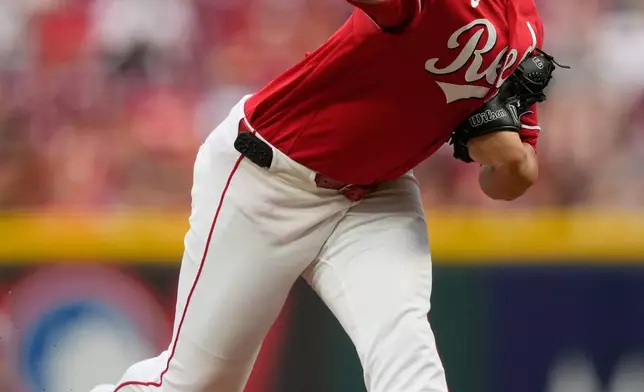 Cincinnati Reds pitcher Brady Singer throws during the first inning of a baseball against the Milwaukee Brewers in Cincinnati, Monday, June 22, 2026. (AP Photo/Carolyn Kaster)