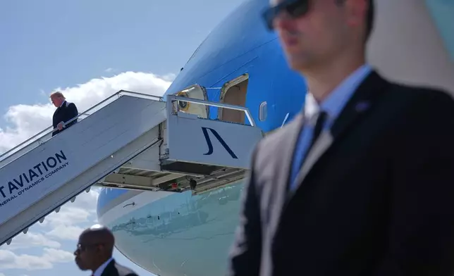 President Donald Trump disembarks Air Force One at Geneva Airport, ahead of the G7 Summit in France, Monday, June 15, 2026, in Geneva, Switzerland. (AP Photo/Julia Demaree Nikhinson)