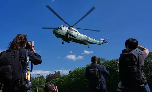 Marine One, with President Donald Trump aboard, arrives for the G7 summit, Monday, June 15, 2026, in Evian-les-Bains, France. (AP Photo/Julia Demaree Nikhinson)