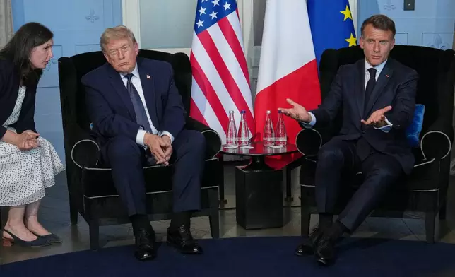 President Donald Trump meets with French President Emmanuel Macron during a bilateral meeting on the sidelines of the G7 summit, Monday, June 15, 2026, in Evian-les-Bains, France. (AP Photo/Julia Demaree Nikhinson)
