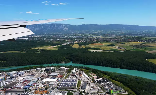 The Rhône River as seen as President Donald Trump arrives on Air Force One at the Geneva Airport, ahead of the G7 Summit in France, Monday, June 15, 2026, in Geneva, Switzerland. (AP Photo/Julia Demaree Nikhinson)