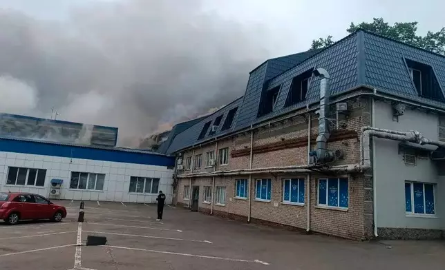 This photo provided by Moscow Region Governor Andrei Vorobyev's official telegram channel shows smoke rising from a damaged building after a Ukrainian drone attack outside Moscow on Thursday, June 18, 2026. (Moscow Region Governor Andrei Vorobyev's official telegram channel via AP)