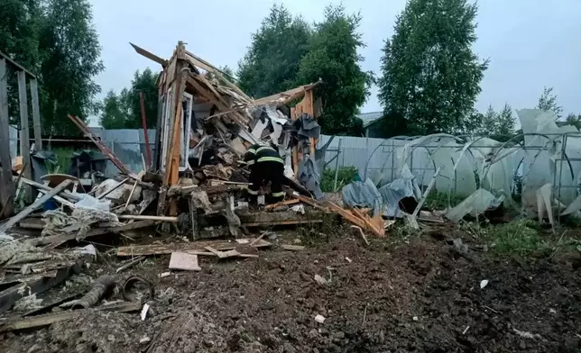 This photo released by Moscow Region Governor Andrei Vorobyev's official telegram channel shows the damage in a country side after a Ukrainian drone attack outside Moscow on Thursday, June 18, 2026. (Moscow Region Governor Andrei Vorobyev's official telegram channel via AP)