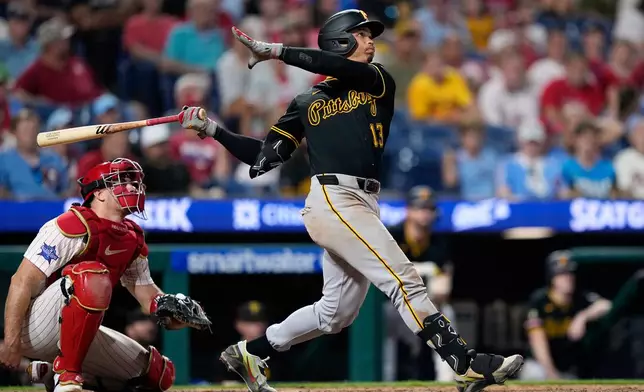 Pittsburgh Pirates' Endy Rodríguez follows through after hitting a three-run home run against Philadelphia Phillies' Chase Shugart during the ninth inning of a baseball game Monday, June 29, 2026, in Philadelphia. (AP Photo/Matt Slocum)