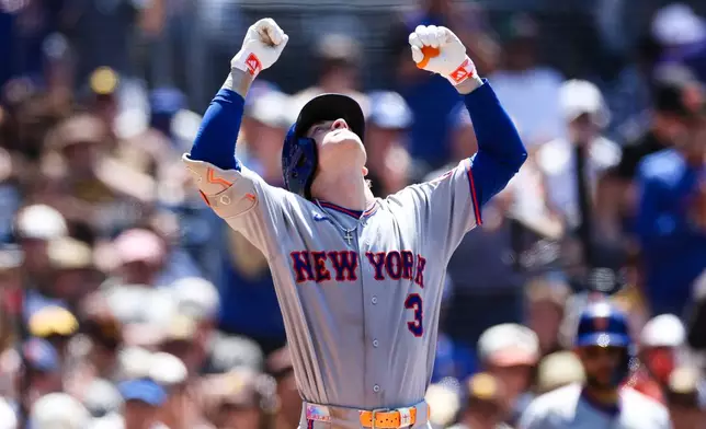 New York Mets' Carson Benge gestures towards the sky as he crosses home plate after hitting a solo home run against the San Diego Padres in the sixth inning of a baseball game Sunday, June 7, 2026, in San Diego. (AP Photo/Derrick Tuskan)