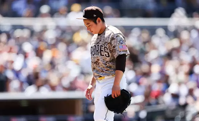 San Diego Padres' Yuki Matsui walks off the mound after being relieved in the sixth inning of a baseball game against the New York Mets Sunday, June 7, 2026, in San Diego. (AP Photo/Derrick Tuskan)