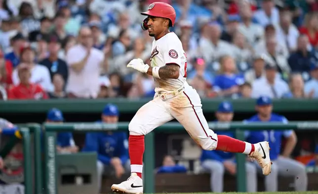 Washington Nationals' Nasim Nuñez heads to home for a score during the third inning of a baseball game against the Kansas City Royals, Tuesday, June 16, 2026, in Washington. (AP Photo/John McDonnell)