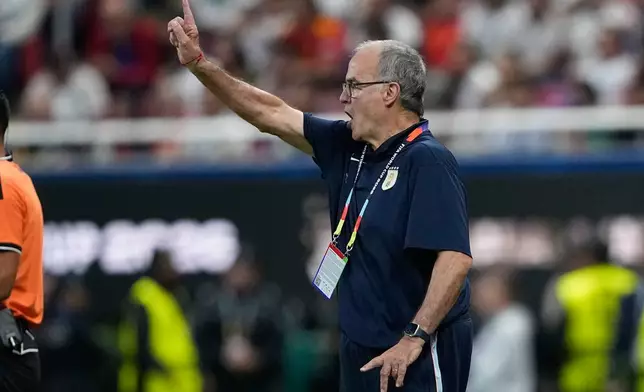 Uruguay head coach Marcelo Bielsa reacts during the World Cup Group H soccer match between Uruguay and Spain in Zapopan, near Guadalajara, Mexico, Friday, June 26, 2026. (AP Photo/Natacha Pisarenko )