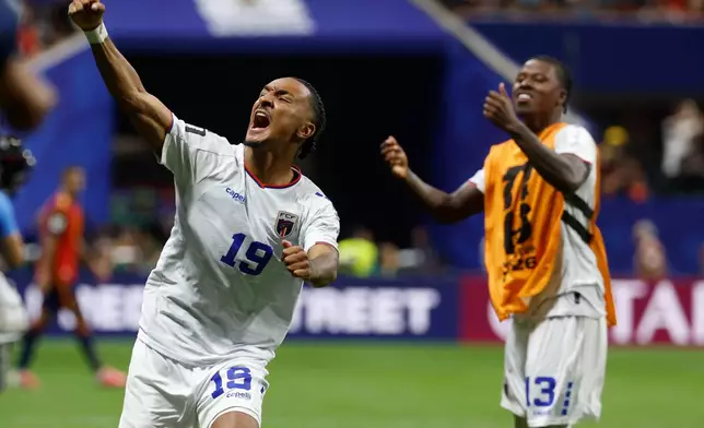 Cabo Verde's Dailon Livramento, left, and Cabo Verde's Sidny Lopes Cabral celebrate after the World Cup Group H soccer match between Spain and Cape Verde in Atlanta, Monday, June 15, 2026. (AP Photo/Erik S. Lesser)