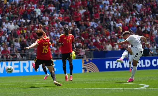 Egypt's Emam Ashour, left false as he celebrates after scoring the opening goal during the World Cup Group G soccer match between Belgium and Egypt in Seattle, Monday, June 15, 2026. (AP Photo/Manu Fernandez)