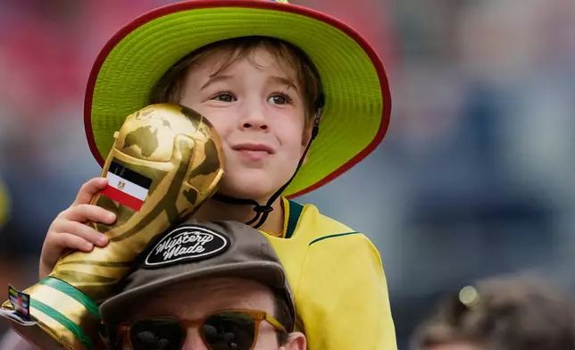 A fan of Egypt waits for the beginning of the World Cup Group G soccer match between in Seattle, Monday, June 15, 2026. (AP Photo/Lindsey Wasson)